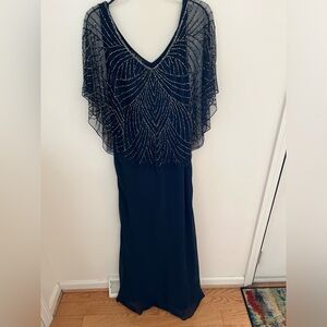 JKARA sleeveless Navy Long Formal Gown with beaded overlay